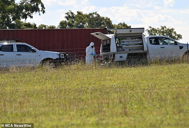 The grisly discovery of two bodies was made after a passerby noticed the smell coming from the shipping container