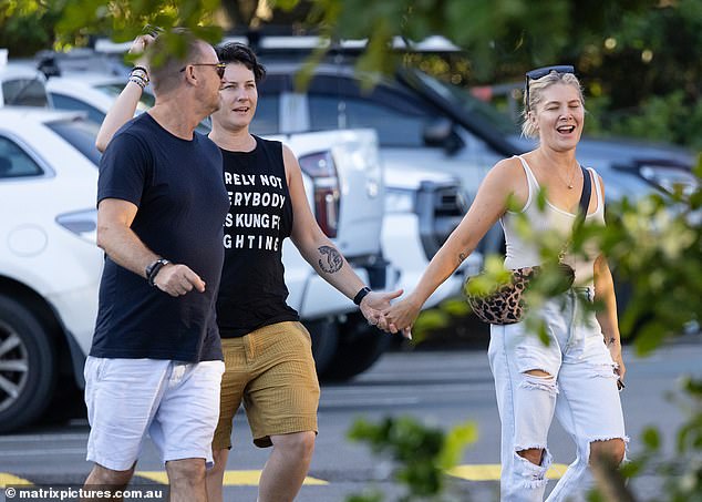 Looking absolutely smitten, Natalie joked with Pip as the pair held hands as they walked through a car park