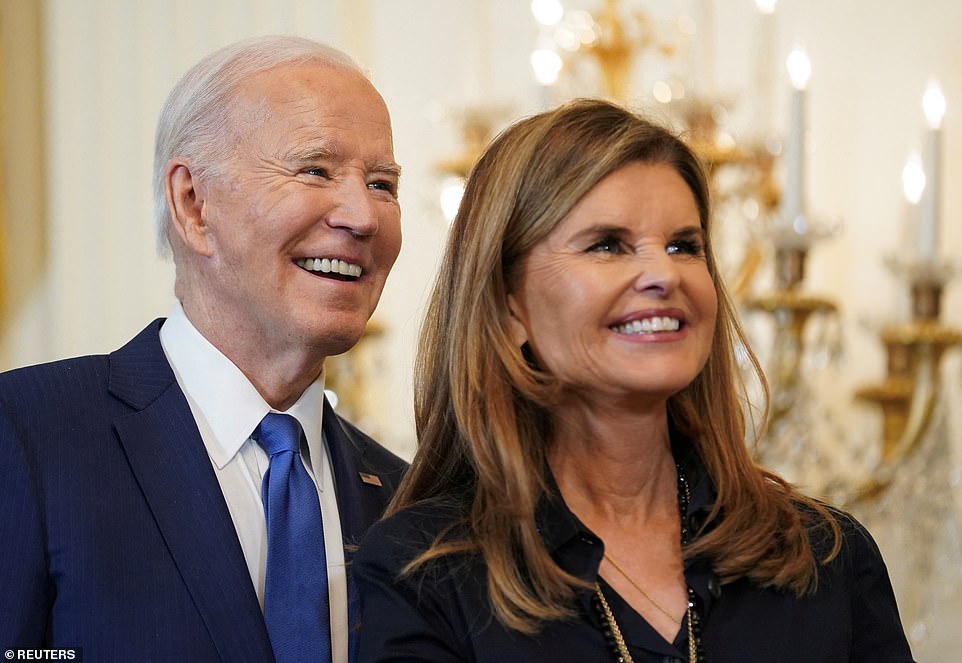 “Dad stood for equal justice, human rights, and freedom from want and fear.  Just like President Biden is doing today.”  She will tell her supporters that a vote for Biden is a vote for democracy.  Pictured: US President Joe Biden and Maria Shriver.