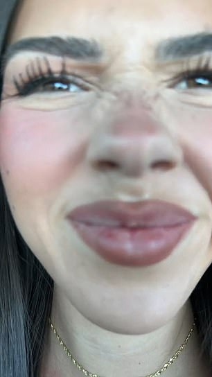 The TikTok video starts with a close-up of Leah's face;  she pouts and looks around before wrinkling her nose