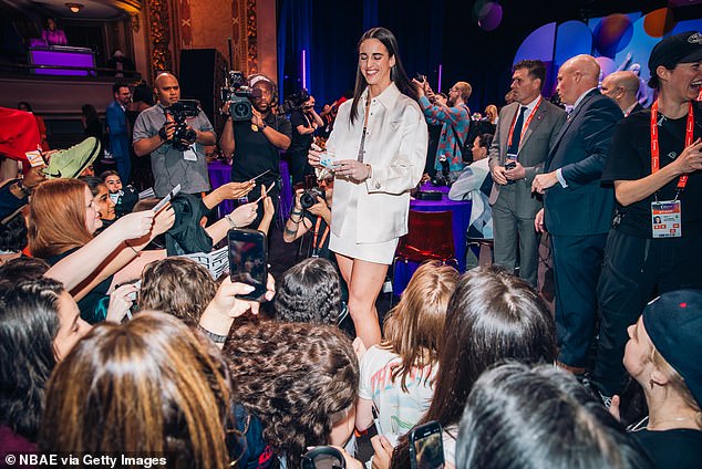 The Indiana Fever star is being mobbed by autograph hunters during this week's draft in New York