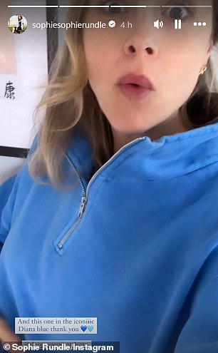 The star also showed off a blue quarter-zip from the same brand in a short clip as she held her stomach