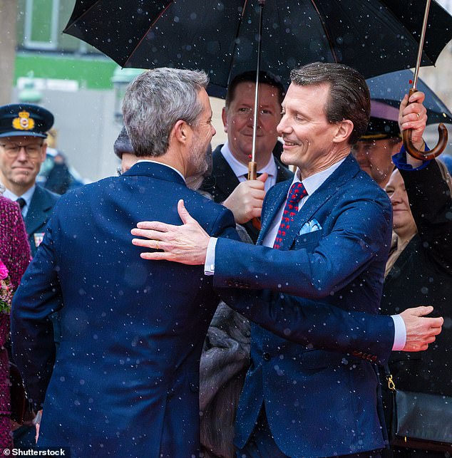 But it appears there is no bad blood in the family as a smiling Joachim, 54, was snapped hugging his brother, the newly crowned King Frederick X - following their mother's abdication in January