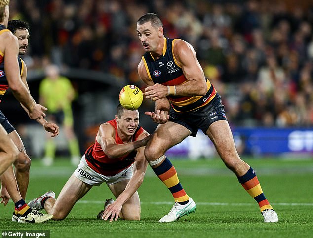 The officials refused to call Draper for holding the ball, denying Crows star Taylor Walker a chance for the match winner