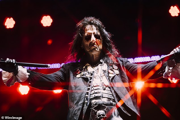 Alice Cooper, 76, (pictured) wowed the crowd with his signature top hat and dramatic make-up