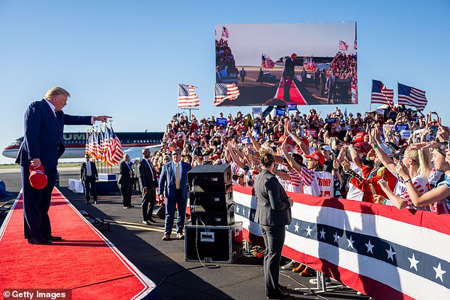 Former President Donald Trump gestures to supporters during his first rally of 2024 on March 25, 2023 in Waco, Texas