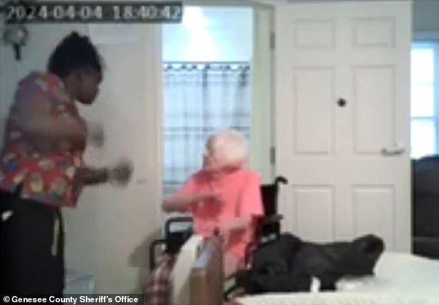 A carer has been caught viciously beating a 93-year-old dementia patient with a dirty nappy before trying to strangle her, in horrific footage released by police