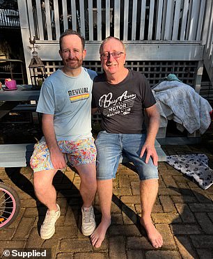 Chris and his dad Jim after Chris's epic weight loss