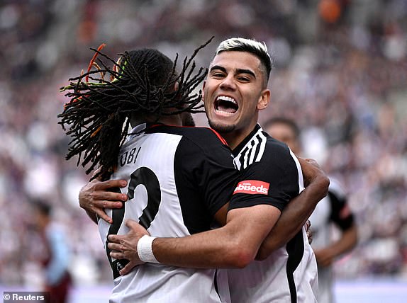 Football - Premier League - West Ham United v Fulham - London Stadium, London, Great Britain - April 14, 2024 Fulham's Andreas Pereira celebrates scoring their second goal with Alex Iwobi REUTERS/Tony Obrien NO USE WITH UNAUTHORIZED AUDIO, VIDEO, DATA , BRACELET FRAMES, CLUB/LEAGUE LOGOS OR 'LIVE' SERVICES.  ONLINE USE IN THE CONTEST LIMITED TO 45 IMAGES, NO VIDEO EMULATION.  NO USE IN ANY BETTINGS, GAMES OR PUBLICATIONS FOR ANY CLUB/LEAGUE/PLAYER.  TPX IMAGES OF THE DAY