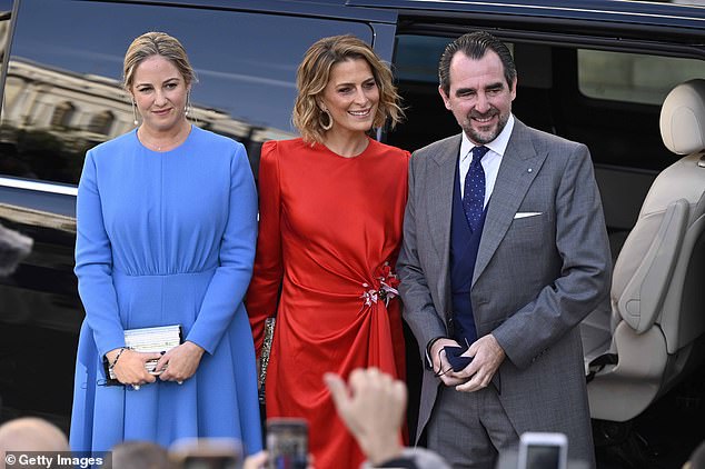 The couple announced their divorce on Friday after fourteen years of marriage.  Pictured: Princess Theodora, Princess Tatiana and Prince Nikolaos in 2021