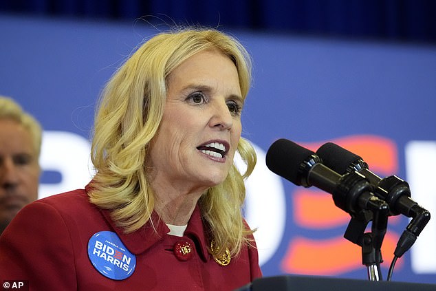 Kerry Kennedy, joined by members of the Kennedy family, speaks for President Joe Biden