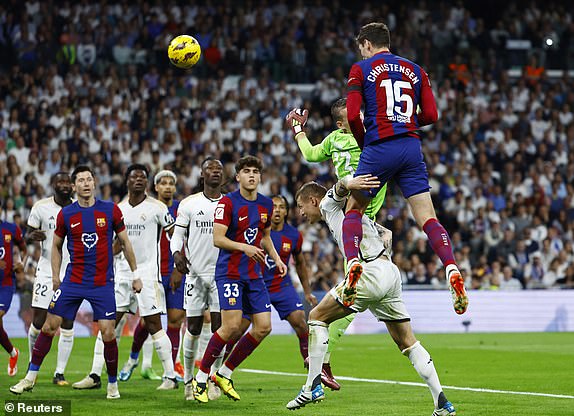 Football - LaLiga - Real Madrid v FC Barcelona - Santiago Bernabeu, Madrid, Spain - April 21, 2024 FC Barcelona's Andreas Christensen scores their first goal REUTERS/Susana Vera