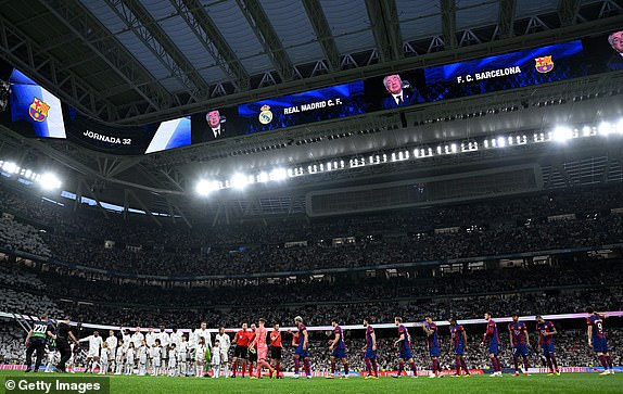 MADRID, SPAIN – APRIL 21: Real Madrid and FC Barcelona players enter the pitch ahead of kick-off for the LaLiga EA Sports match between Real Madrid CF and FC Barcelona at Estadio Santiago Bernabeu on April 21, 2024 in Madrid, Spain.  (Photo by David Ramos/Getty Images) (Photo by David Ramos/Getty Images)