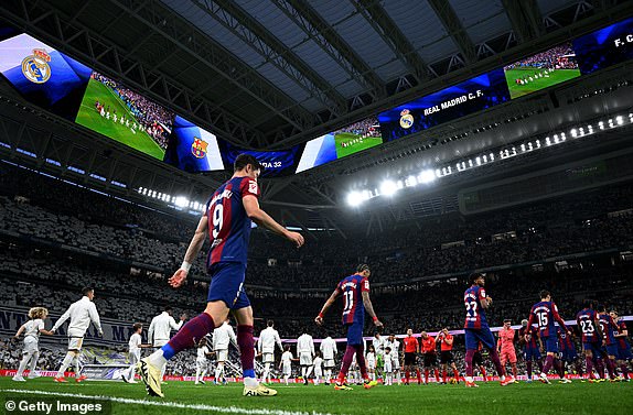 MADRID, SPAIN – APRIL 21: Robert Lewandowski of FC Barcelona enters the pitch prior to kick-off for the LaLiga EA Sports match between Real Madrid CF and FC Barcelona at Estadio Santiago Bernabeu on April 21, 2024 in Madrid, Spain.  (Photo by David Ramos/Getty Images) (Photo by David Ramos/Getty Images)