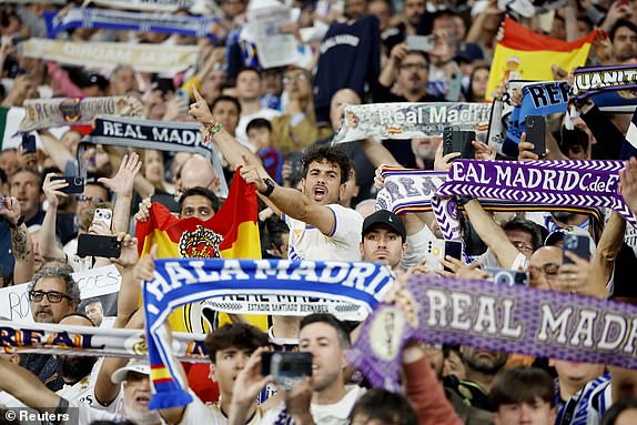 Football - LaLiga - Real Madrid v FC Barcelona - Santiago Bernabeu, Madrid, Spain - April 21, 2024 Real Madrid fans react in the stands before the match REUTERS/Juan Medina