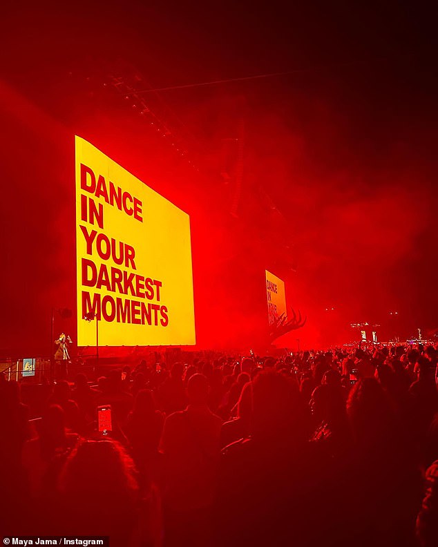 She also took a photo of the crowd of a sign that read 