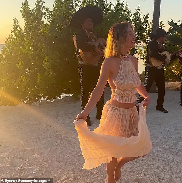 The Spokane-born, LA-raised bombshell shared a video of herself dancing barefoot on the beach while dressed in a nude halter top and matching maxi skirt