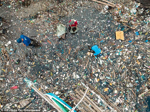 Garbage in a river in Manila, Philippines.  Expanded polystyrene has taken over our world (stock image)