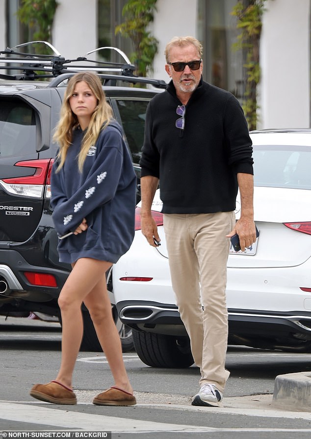 For his Sunday outing, Costner looked sharp in a black sweater, khaki pants and gray sneakers