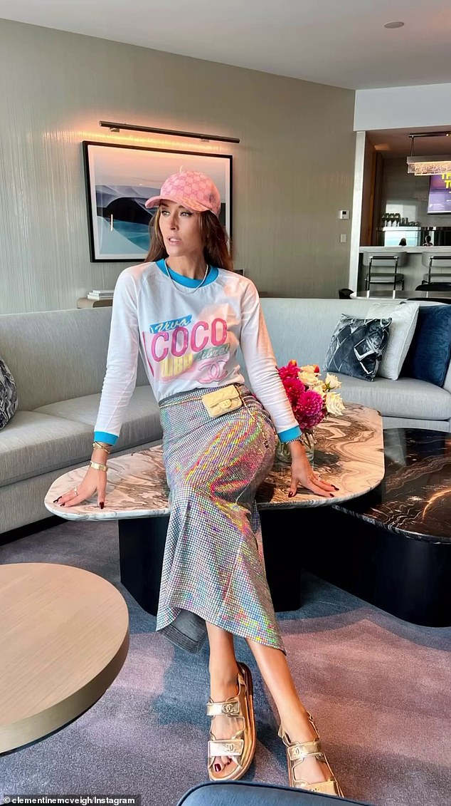 The model wore a Chanel long-sleeved T-shirt from the brand's 2017 Cruise collection, paired with a statement Manning Cartell skirt.  She completed the look with a $750 pink Gucci baseball hat, a $5,500 mini Chanel flap fanny pack and Chanel leather sandals worth a whopping $6,716.