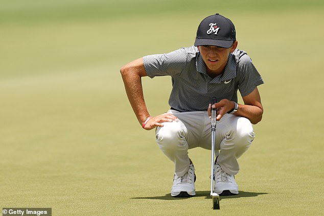 The 15-year-old watches from the 17th green during the LECOM Suncoast Classic on Sunday