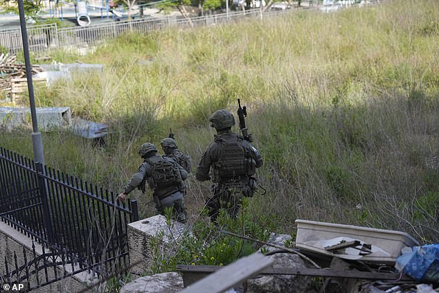 Israeli troops pursue suspected attackers in ram attack that left three people 'slightly injured'