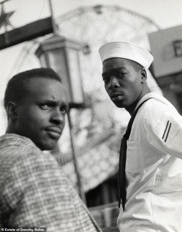 Two men look stunned as Bohm takes their photo in Coney Island, New York, in 1956