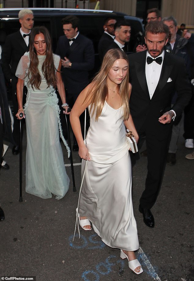 Victoria was seen carrying walking sticks to her party after breaking her foot at the gym in February