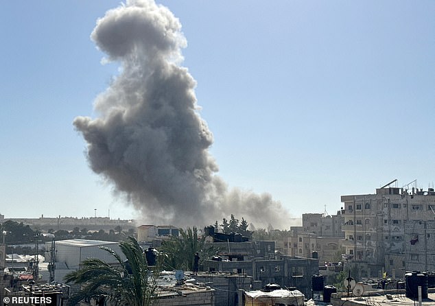 Smoke rises after Israeli attacks, amid the ongoing conflict between Israel and Hamas, in Rafah in the southern Gaza Strip, April 21, 2024