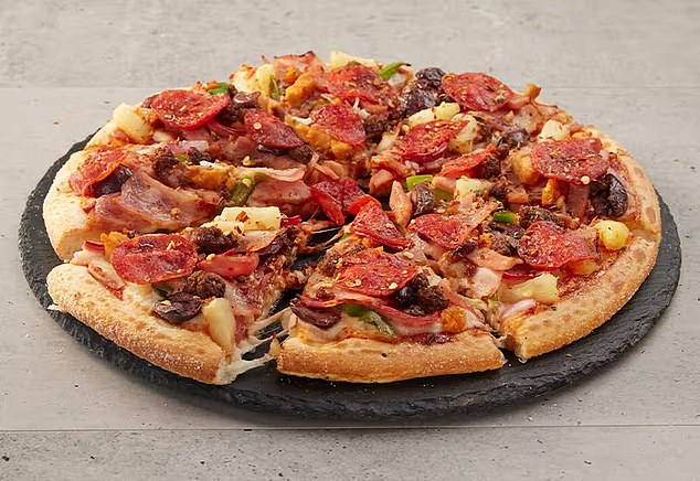 She ordered The Lot, which comes with ground beef, bacon, bell pepper, pepperoni, Italian sausage, chicken, smoked ham, pineapple, onions and olives