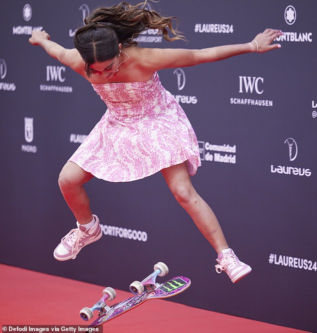 Trew (pictured on the red carpet at the Laureus Awards in Madrid) became the first female skater ever to land a 720 in 2023 at the age of just 13