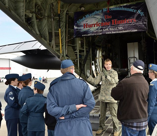 Mitchell would fly the WC-130J Super Hercules through the eye of active hurricanes to collect weather data using aircraft - known as a team called 'Hurricane Hunters'