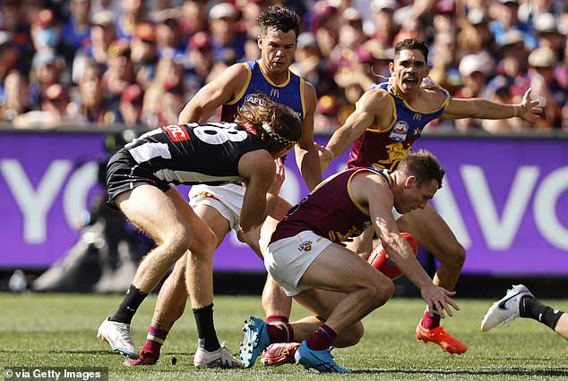 As a key defender, Murphy often threw his head into tough matches which played a role in the concussion that ended his career prematurely (pictured in last year's grand final)