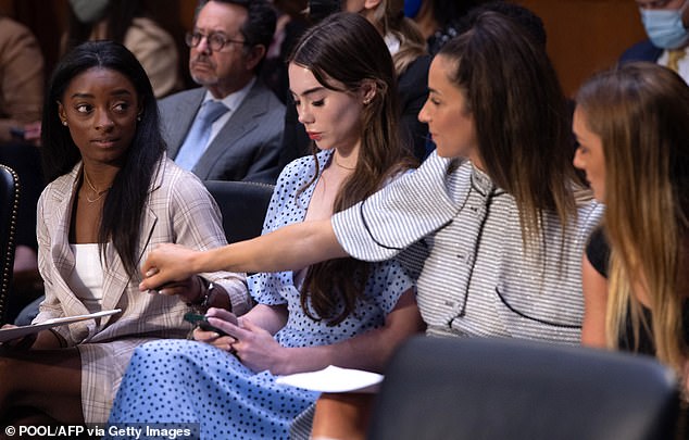In 2021, Simone Biles, McKayla Maroney, Aly Raisman and Maggie Nichols (left-right) arrive to testify at a hearing on the FBI's handling of sexual assault allegations against Nassar.