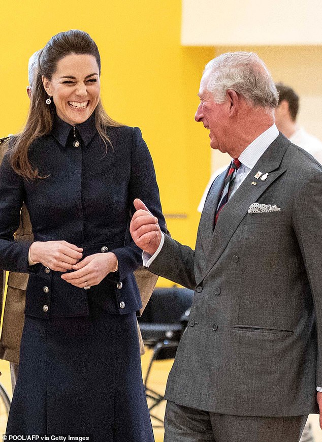 Kate, 42, has been made a Royal Companion of the organisation, which was founded by King George V in 1917 to recognize outstanding achievements in the arts, sciences, medicine and public service.  Above: Kate and Charles visit the Defense Medical Rehabilitation Center (DMRC) in Loughborough in February 2020