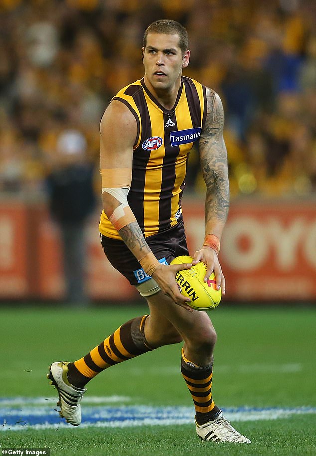 After originally starring for Hawthorn (pictured), Buddy has excelled for the Swans - and will be there this weekend when his old teams face off in Melbourne