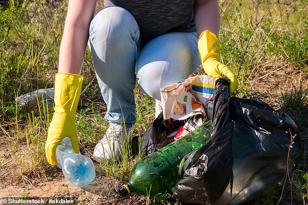 Public Service: The winning couple gives back to our community by picking up trash (file photo)