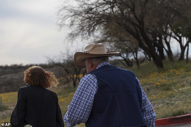 Kelly has said he fired warning shots into the air but did not shoot anyone directly.  Pictured: Kelly leaving the courthouse with his attorney Kathy Lowthorp on March 22