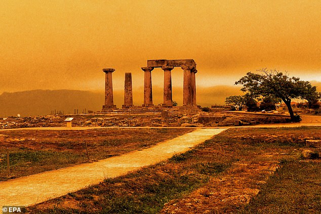 The Temple of Apollo in Corinth, Greece, looked orange after dust flew into the southern coast