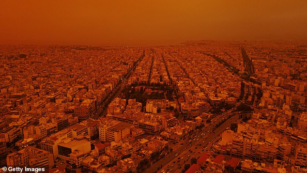 World-famous tourist sights took on a unique look after the dust cloud passed over the capital (photo, from above)