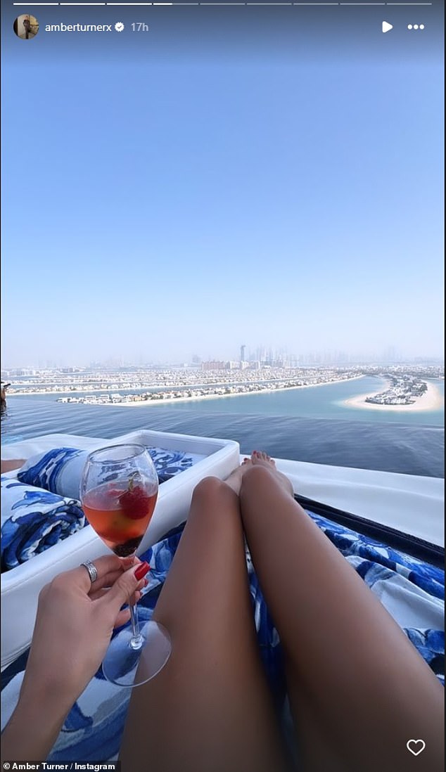 Amber, 30, spent her Wednesday at a rooftop bar.  Amber shared a photo of her incredible view while kicking back with a drink