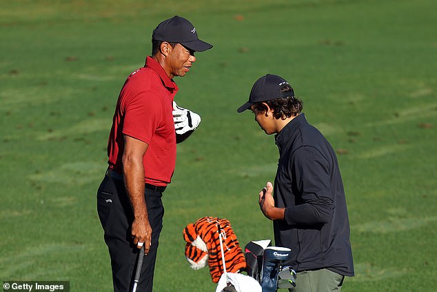 Charlie accompanied his father at the shooting range at Augusta and even appeared to give him swing advice