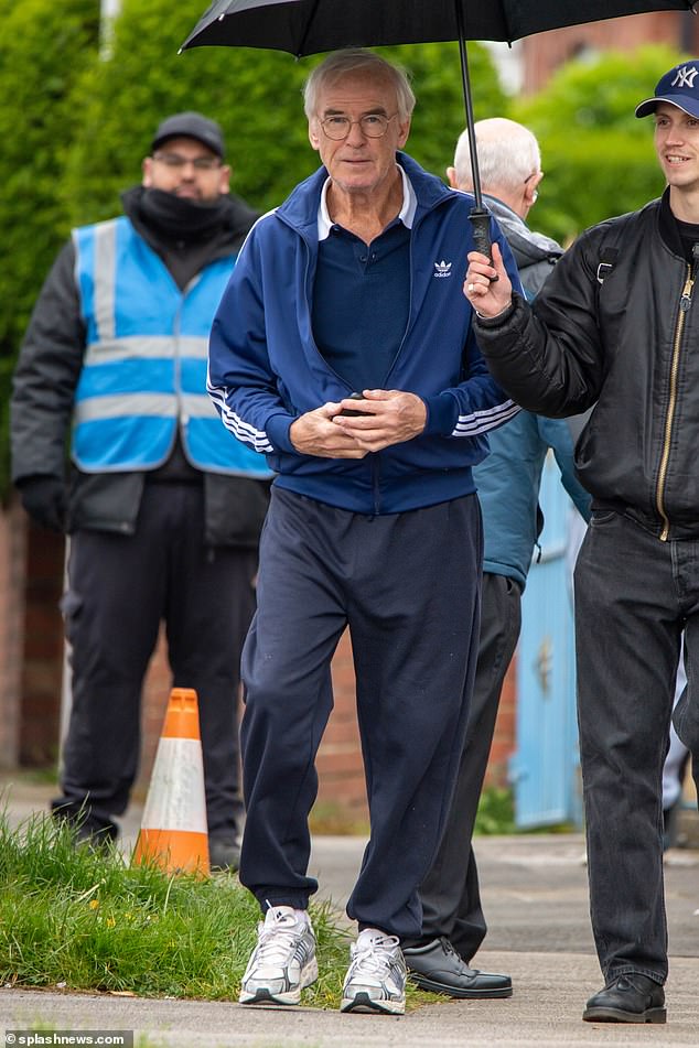 The Hollywood star's trademark sharp suits for his role as Bond were long gone as he stepped out in a blue Adidas tracksuit in Yorkshire