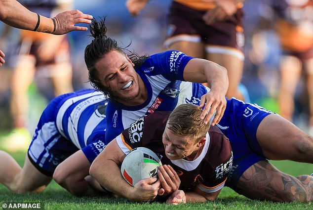 Topine, pictured tackling Broncos star Billy Walters, was reportedly forced to wrestle 35 of his teammates as punishment for arriving late