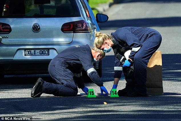 Aaron Toth was pronounced dead at the scene as Victoria Police investigate (pictured are officers at the scene)