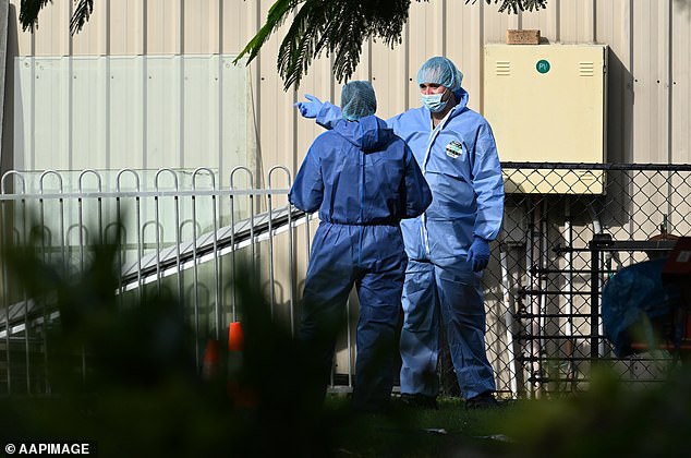 Police described the crime scene north of Brisbane as 'incredibly traumatic' (photo police forensics staff at the couple's home)