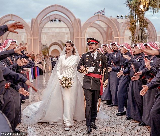 Crown Prince Hussein of Jordan and his wife Princess Rajwa are expecting a baby this summer.  Pictured during their wedding in June