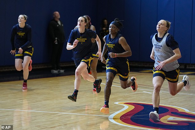 Clark (center left) in practice with teammates including Erica Wheeler (center) in Indianapolis