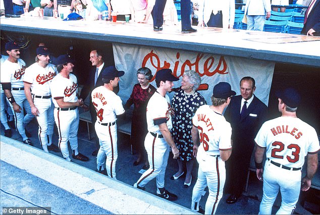 Members of the Baltimore Orioles baseball team meet Queen Elizabeth, Prince Philip and President George W. Bush and First Lady Barbara Bush during a May 1991 visit to Memorial Stadium, the predecessor to Camden Yards