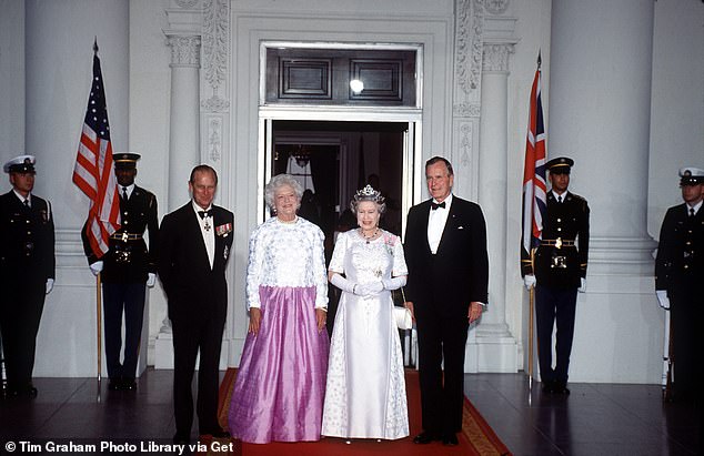 Prince Philip (from left), First Lady Barbara Bush, Queen Elizabeth and President George HW Bush pose for a photo during the state dinner that was part of the monarch's visit to the White House in May 1991